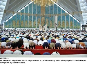 APP03-13 ISLAMABAD: September 13  A large number of faithful offering Eidul Azha prayers at Faisal Masjid. APP photo by Saeed-ul-Mulk