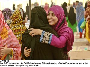 APP19-13 LAHORE: September 13  Faithful exchanging Eid greeting after offering Eidul Azha prayers at the Badshahi Masjid. APP photo by Rana Imran