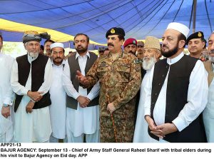 APP21-13 BAJUR AGENCY: September 13 - Chief of Army Staff General Raheel Sharif with tribal elders during his visit to Bajur Agency on Eid day. APP