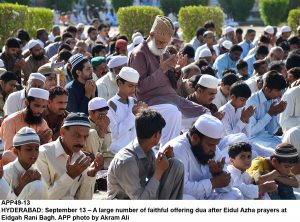 APP49-13 HYDERABAD: September 13  A large number of faithful offering dua after Eidul Azha prayers at Eidgah Rani Bagh. APP photo by Akram Ali