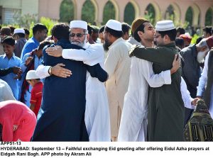 APP51-13 HYDERABAD: September 13  Faithful exchanging Eid greeting after offering Eidul Azha prayers at Eidgah Rani Bagh. APP photo by Akram Ali