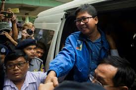 Myanmar court remands Reuters journalists for 2 more weeks